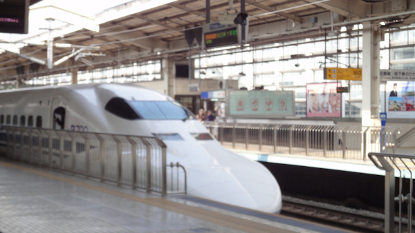 the nose cone and front windows of a shinkansen